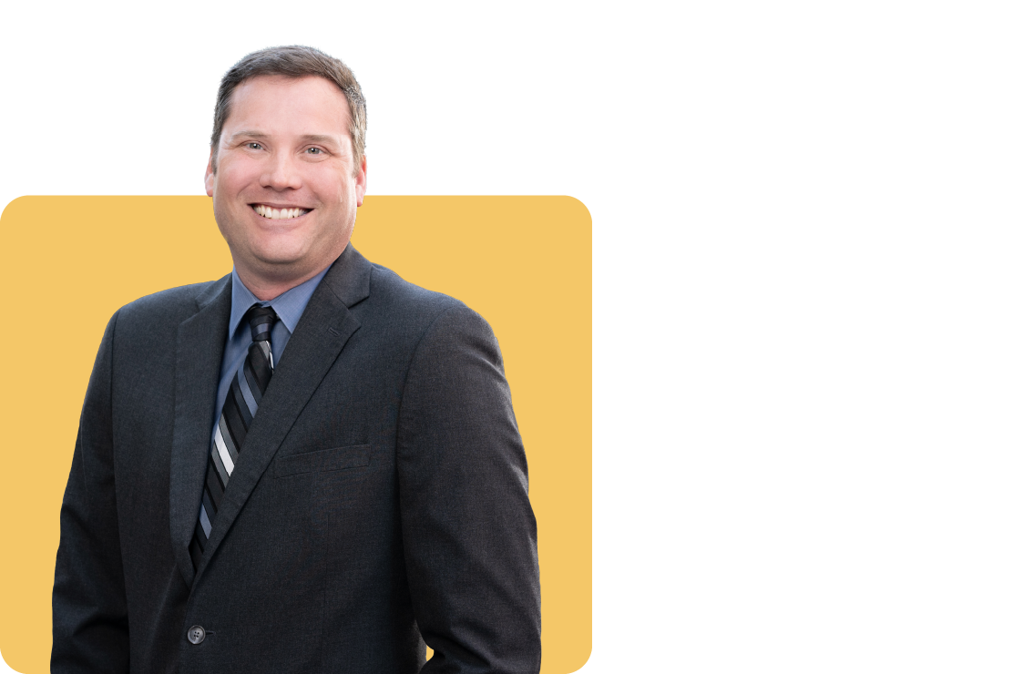 Photo of David Rosenau on a yellow background