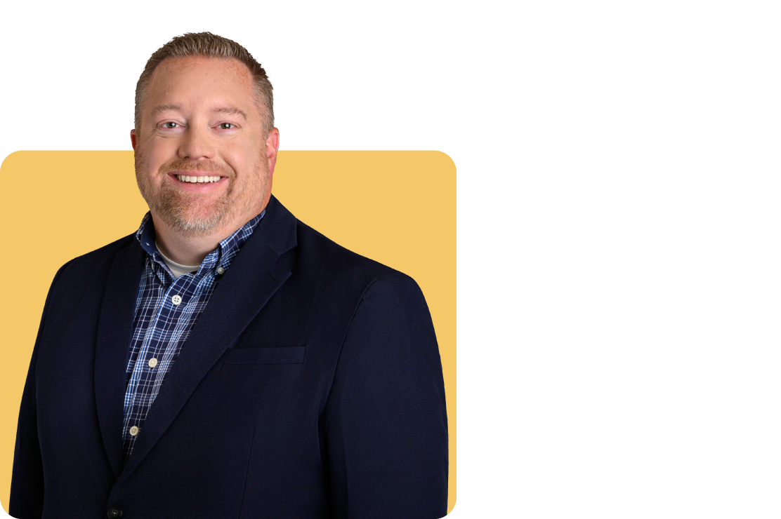 Photo of Greg Hoagland on a yellow background