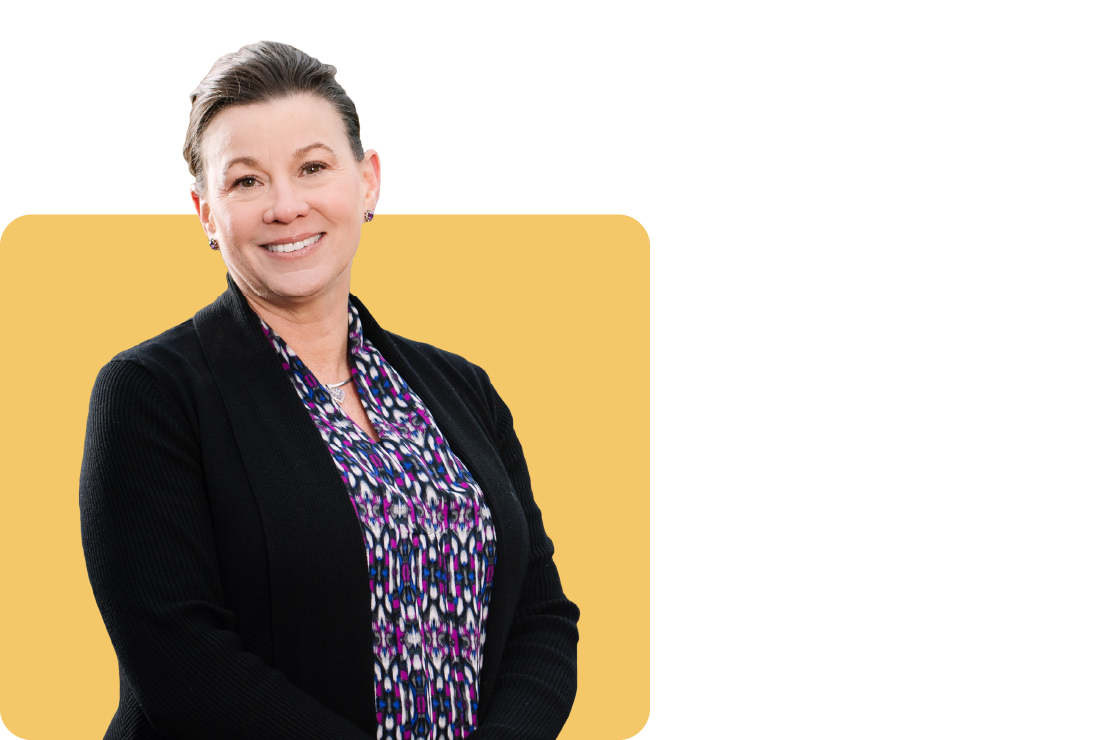 Photo of Tracy Aynes on a yellow background