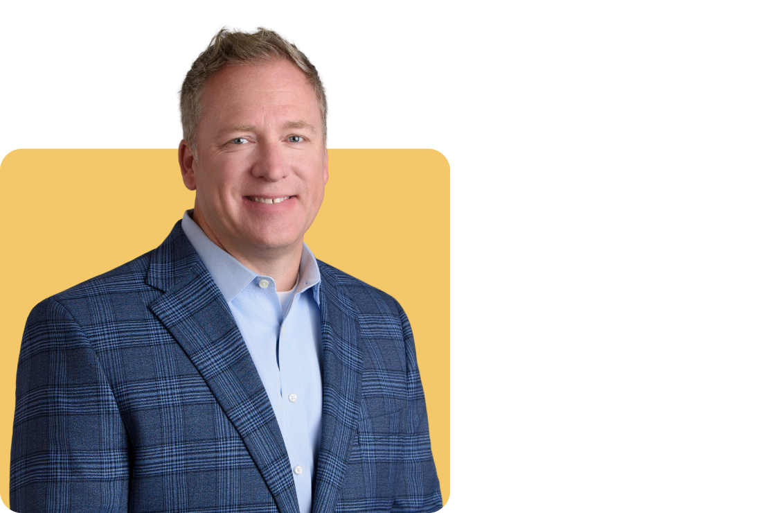 Photo of Trevor Young on a yellow background