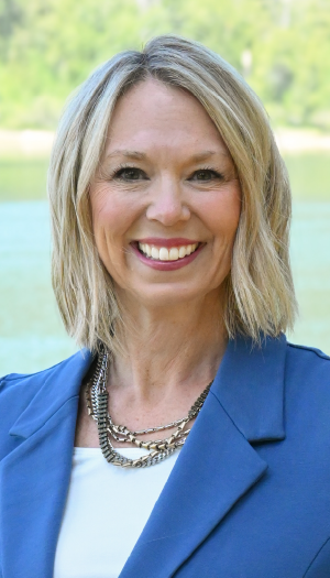Photo of Lindsey Myhre in front of a river