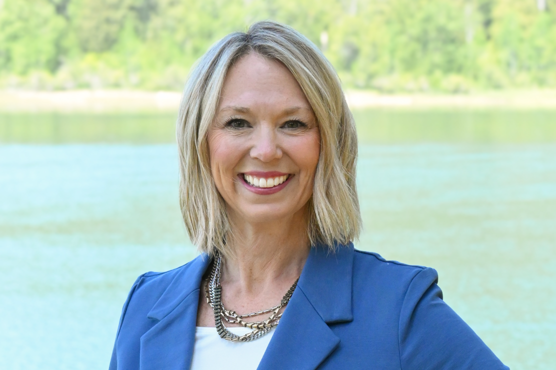 Photo of Lindsey Myhre in front of a river
