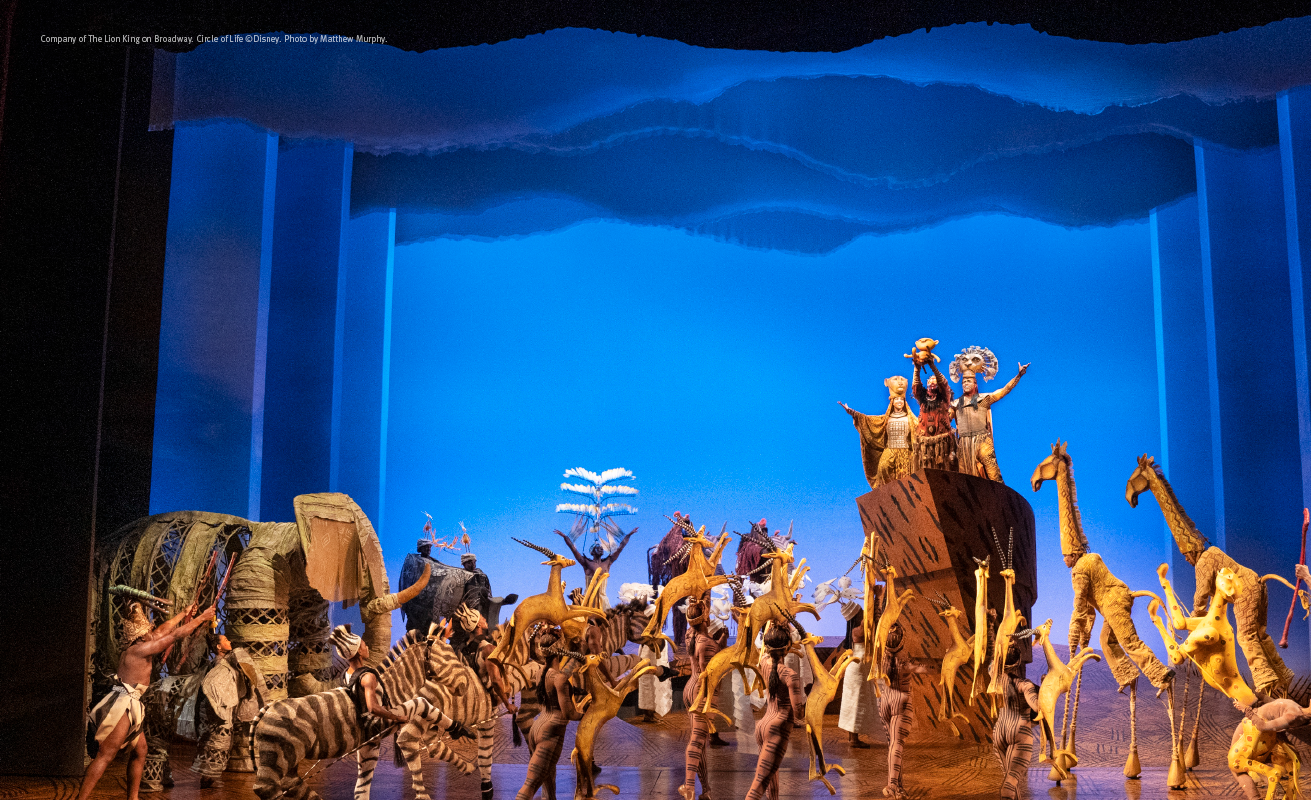 Performers on stage during a performance of Disney's The Lion King