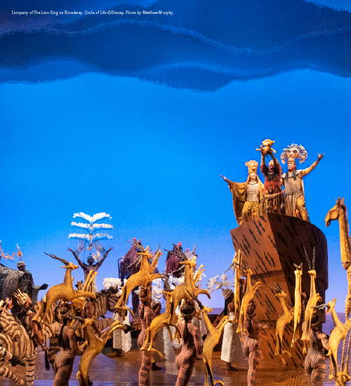 Performers on stage during a performance of Disney's The Lion King