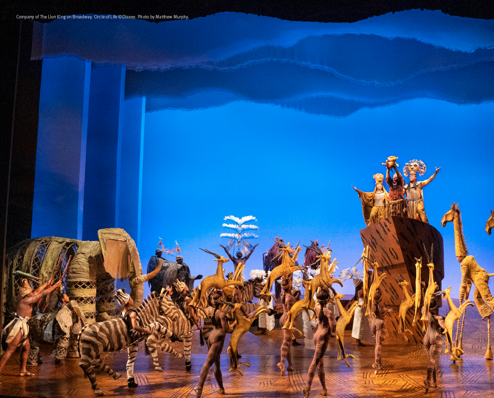 Performers on stage during a performance of Disney's The Lion King