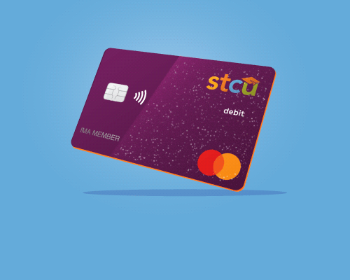 Photo illustration of a purple STCU debit card
