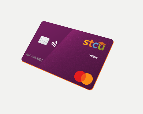 Photo illustration of a purple STCU debit card