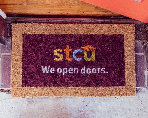 A door mat that says STCU