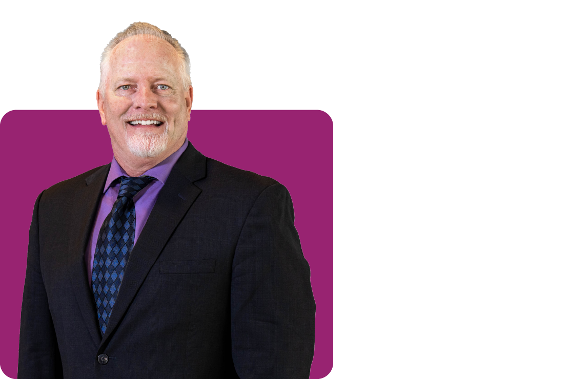 A photo of Greg Templeton on a purple background
