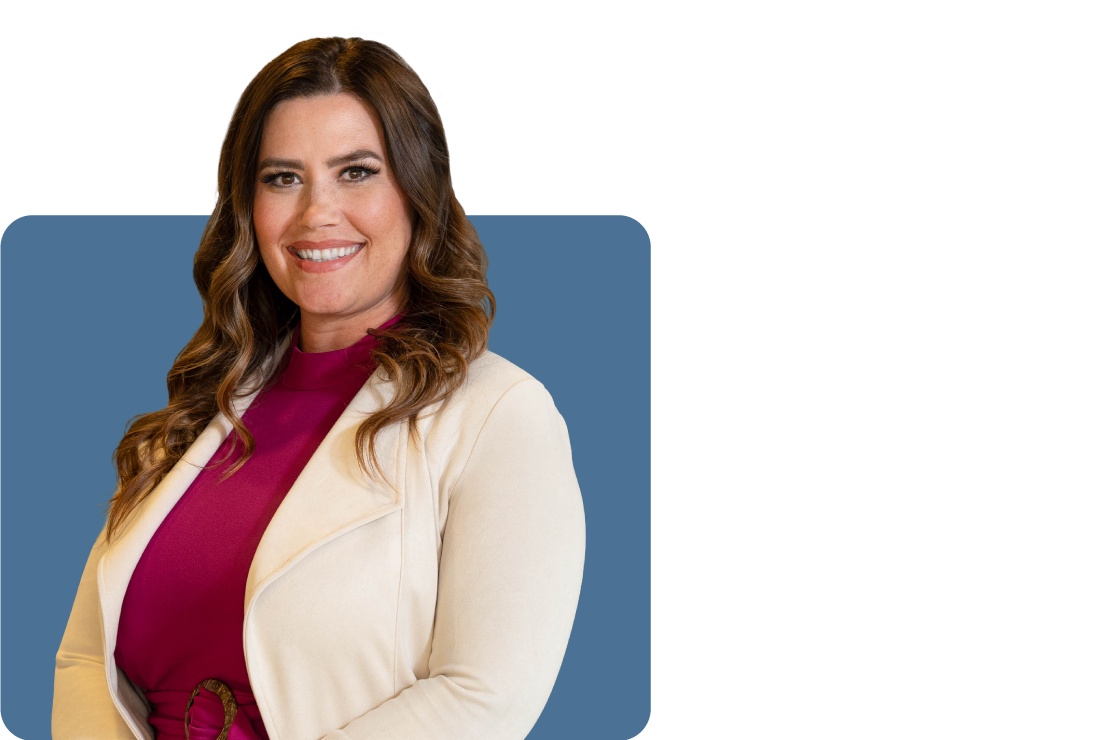 Headshot photo of Anna Bowers set against a blue backdrop