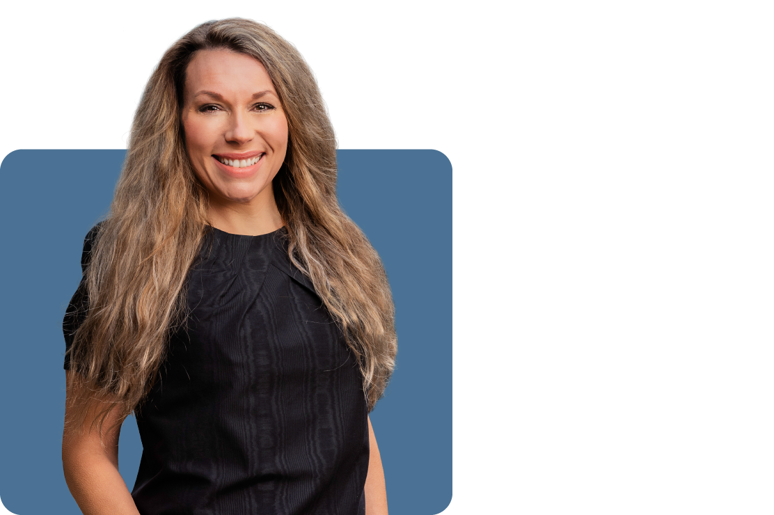 Headshot photo of Lindsay Burdett set against a blue backdrop